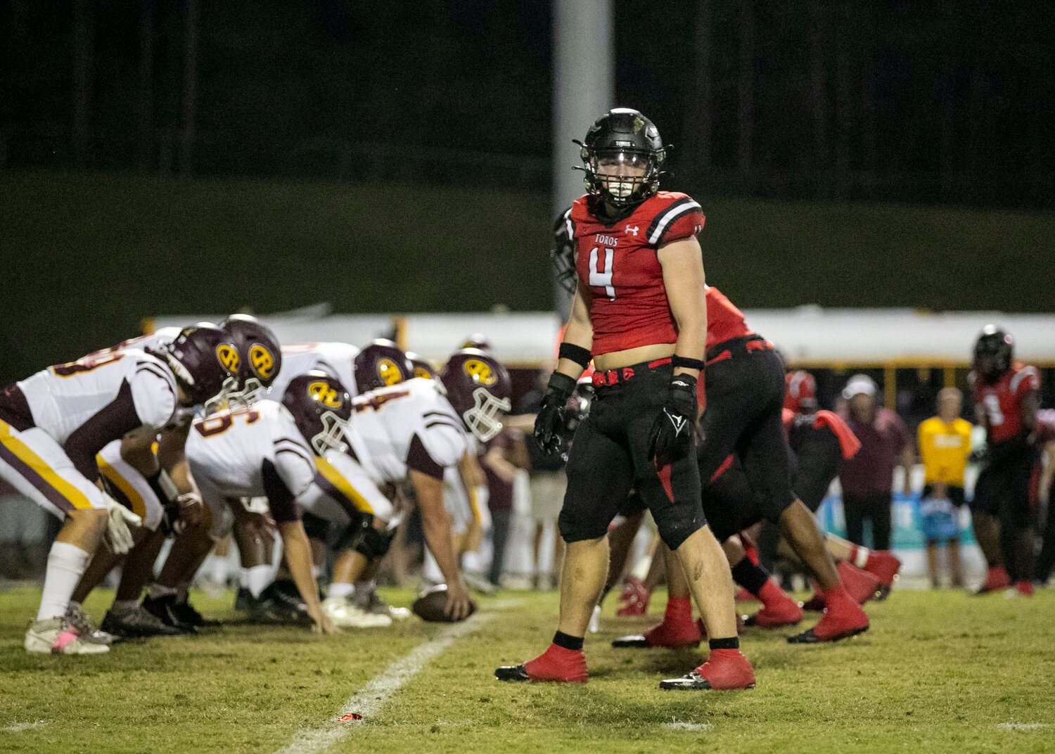 Toro junior linebacker Bishop Burkhalter waits for a defensive signal Friday night in Class 6A Region 1 action against the Robertsdale Golden Bears at home. Burkhalter and the defense kept the visitors off the board with a 45-0 win to move to 6-1 in the region standings.