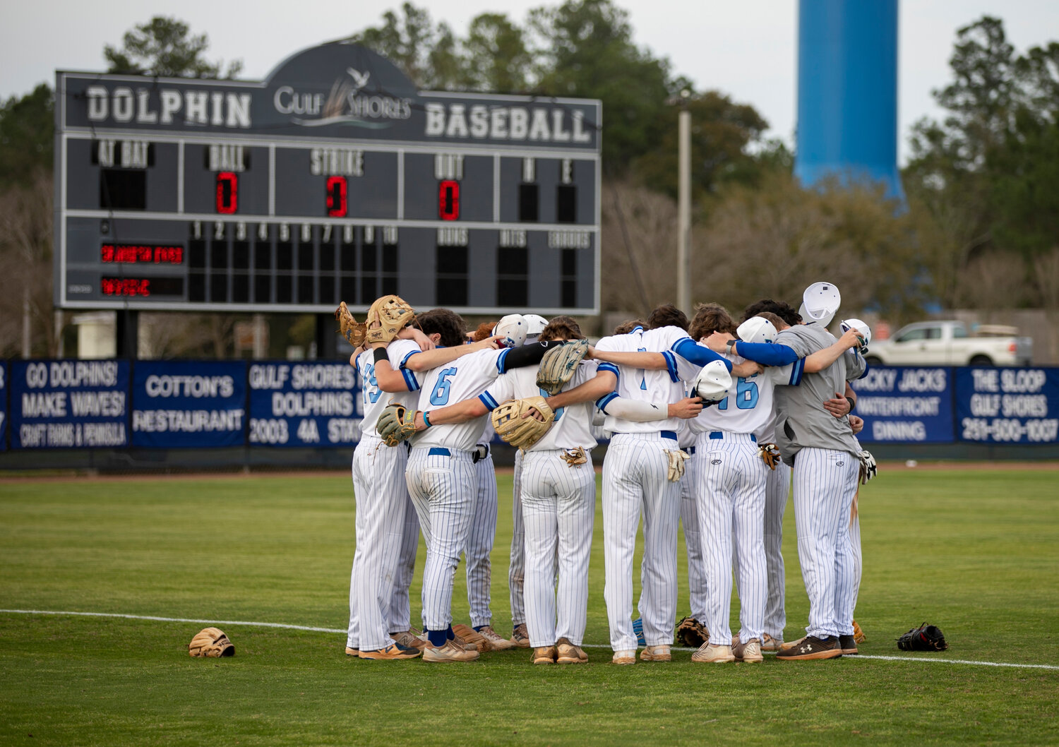 The Bayside Academy Admirals gather for a pregame prayer ahead of their South Alabama Showdown game against the Spanish Fort Toros on Feb. 23 at the Gulf Shores Sportsplex. Prep Baseball Report is set to return to the Gulf Coast for the second-annual event that will feature Bayside Academy in the 12-team field of playoff contenders.