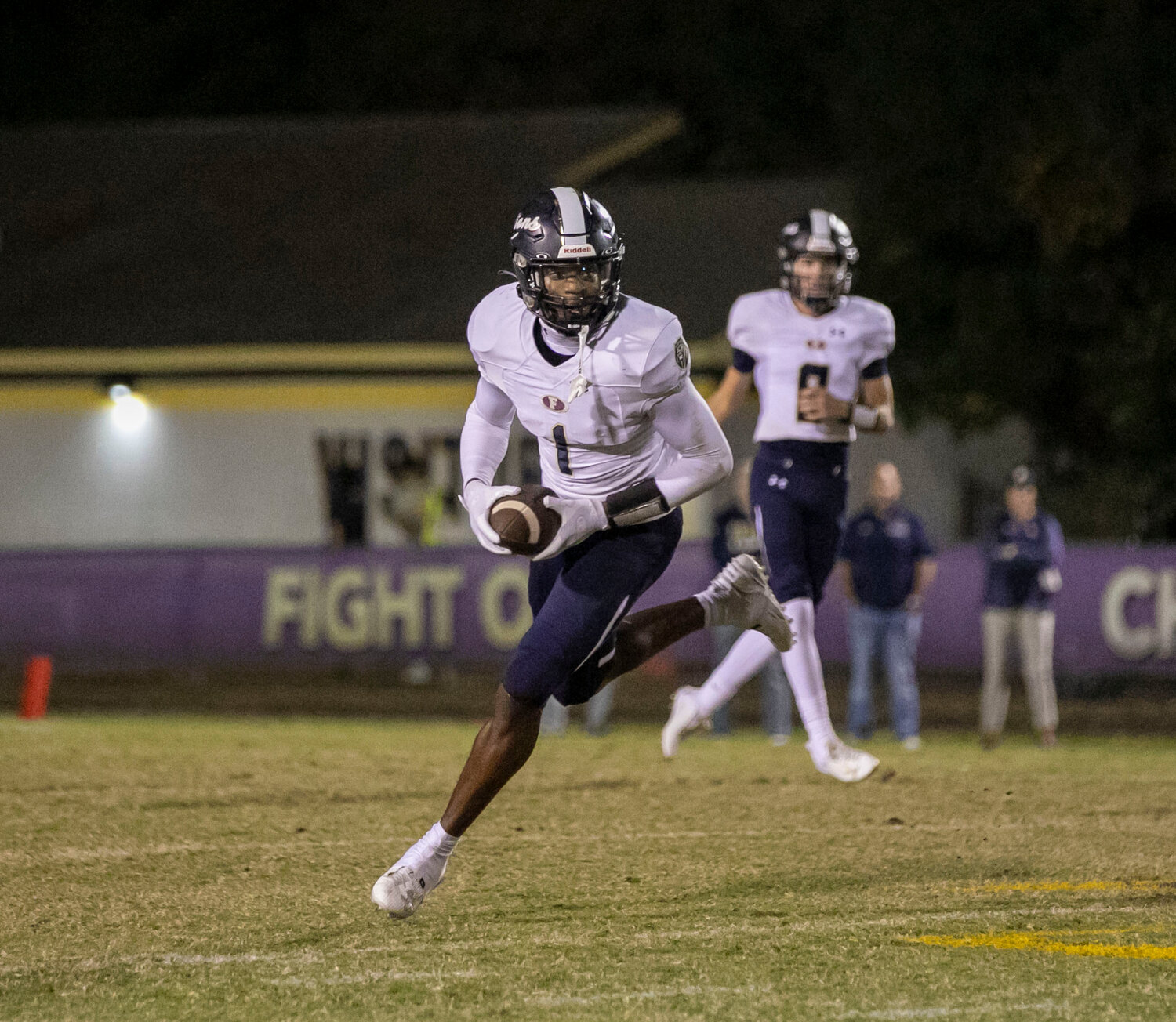 Perry Thompson secures a catch on a screen pass during the first half of action between the Foley Lions and Daphne Trojans at Jubilee Stadium on Friday, Oct. 27. The Auburn commit recorded a 50-yard touchdown catch where he outraced everyone the final 30 yards.