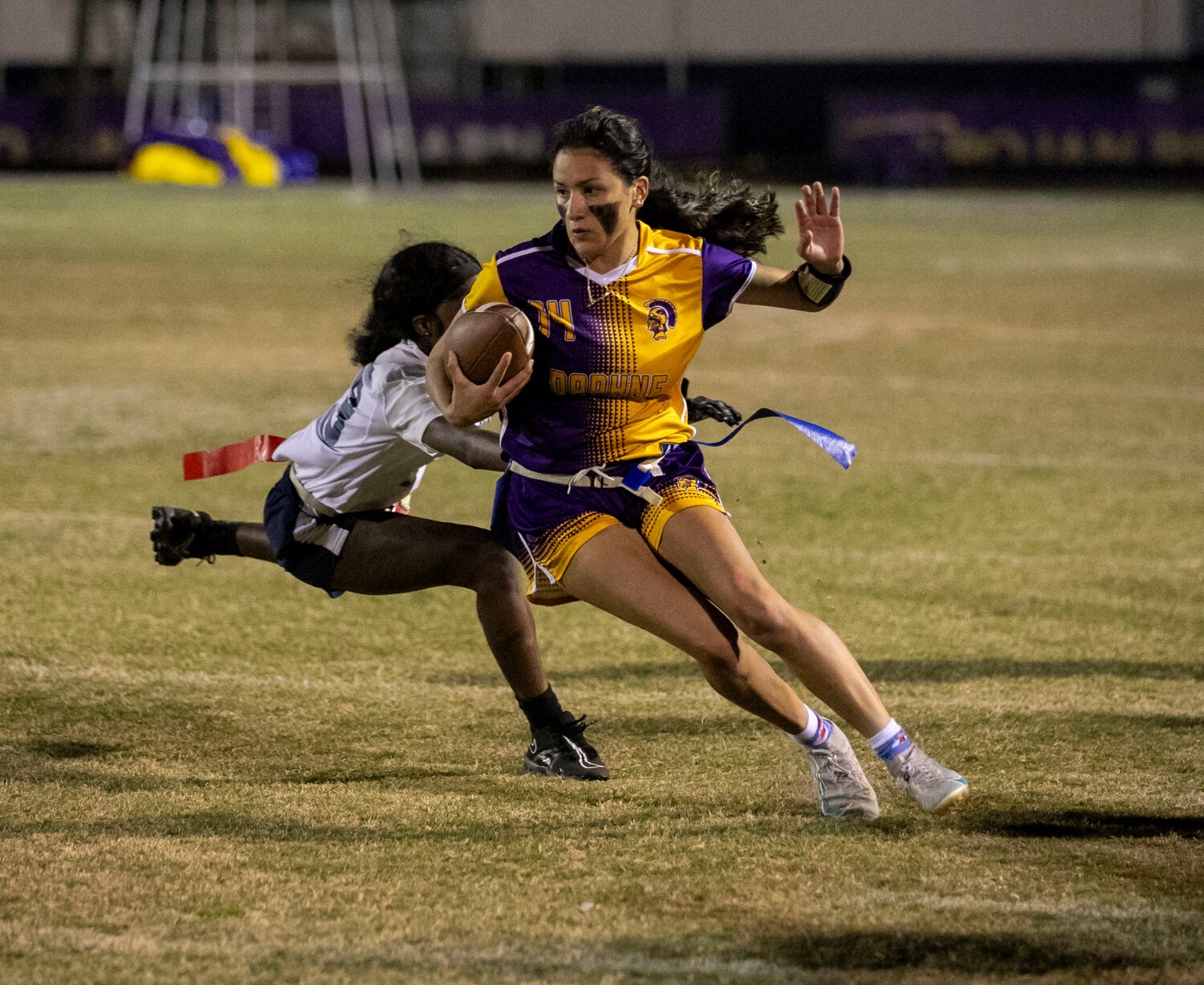Junior Lex Charqueno escapes an Alma-Bryant tackler while tight roping the sideline after a catch during the Daphne Trojans’ regional championship game against the Hurricanes on Monday, Oct. 30, at Jubilee Stadium. Charqueno caught a touchdown pass that helped Daphne punch its ticket to the state tournament in its inaugural season.