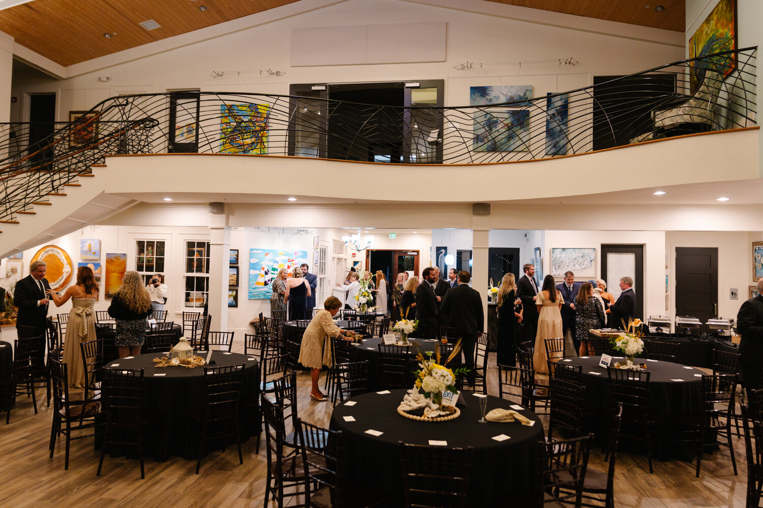 Attendees of the inaugural BCCAC Fall Ball standing inside the Coastal Arts Center on Nov. 2. The event, which brought in $31,500, was a way to raise money to support a cause, hoping to end child abuse.