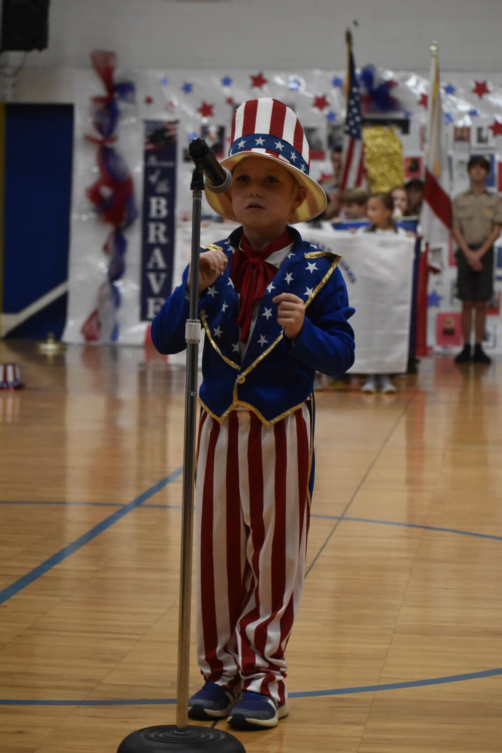 Second grade students at Fairhope West Elementary School honor local veterans with a musical tribute.