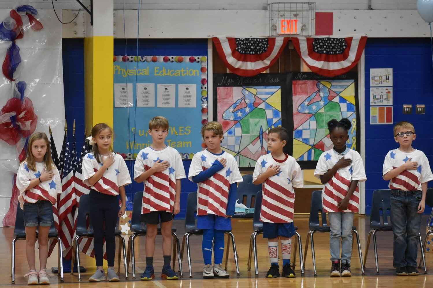 Second grade students at Fairhope West Elementary School honor local veterans with a musical tribute.