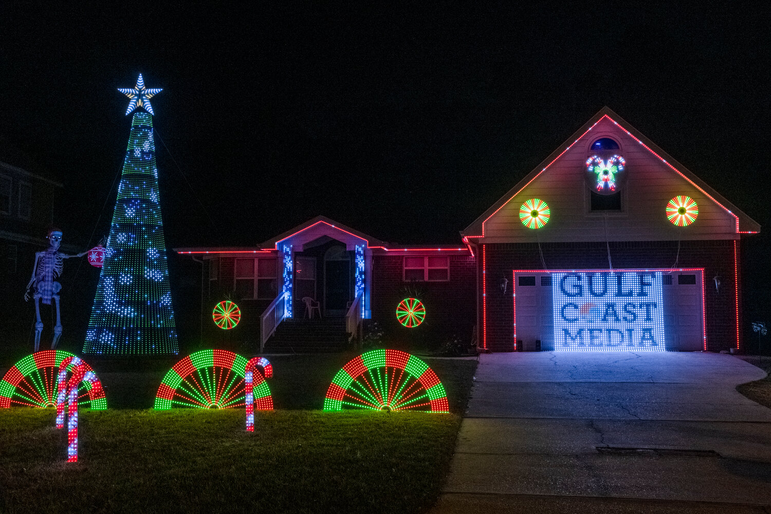 Riff Becknauld’s RiFFsmas Christmas light display on Bear Creek Cove in Gulf Shores.