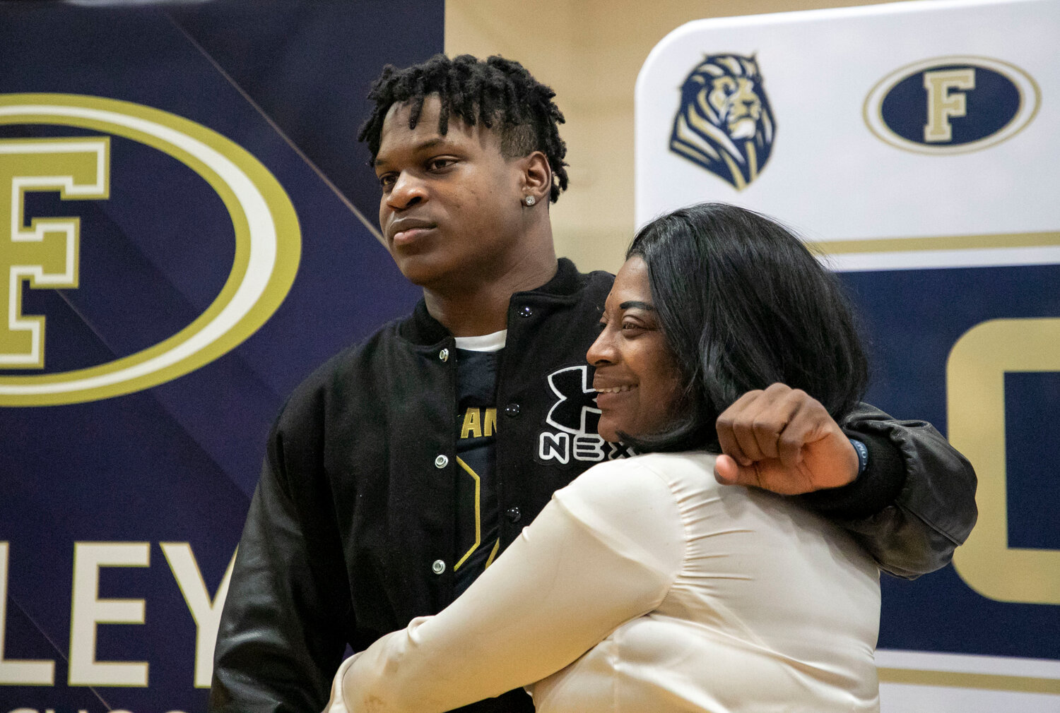Perry Thompson shares an embrace with his mother Tennille at the ceremony in Foley on Friday, Nov. 17, where the receiver was presented his jersey ahead of the Under Armour All-America Game set for Jan. 3, 2024.