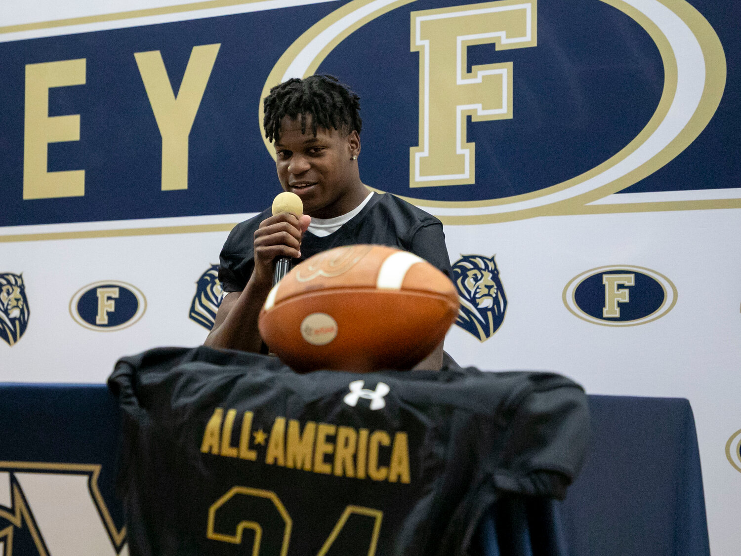Lion senior Perry Thompson addresses the crowd on hand during Friday’s ceremony at Foley High School where he received his Under Armour All-America jersey. Thompson said he looked forward to representing his school and seeing what his talents do against the top high school prospects in the nation.