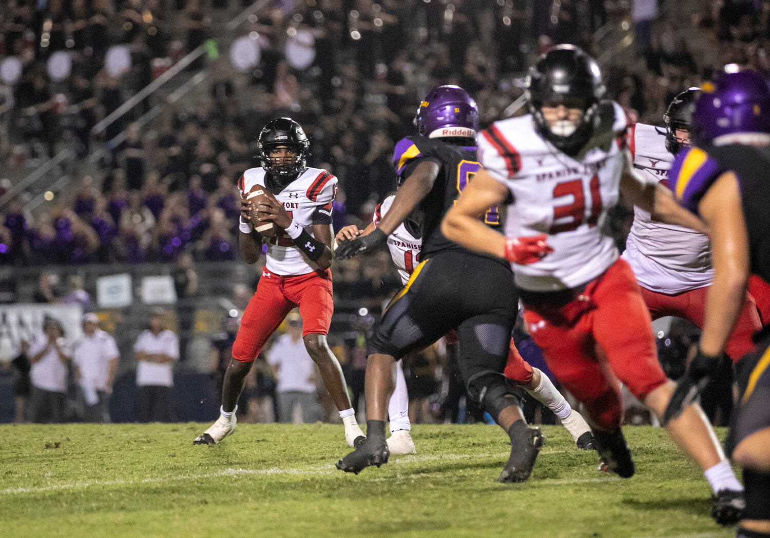 Toro sophomore quarterback Aaden Shamburger eyes the defense while senior Chandler Wilson (31) gets a release during Spanish Fort’s away rivalry game against the Daphne Trojans on Sept. 29 at Jubilee Stadium. Shamburger finished the season with 1,270 passing yards where 143 of them, and 3 of the quarterback’s 12 touchdowns, went to Wilson.