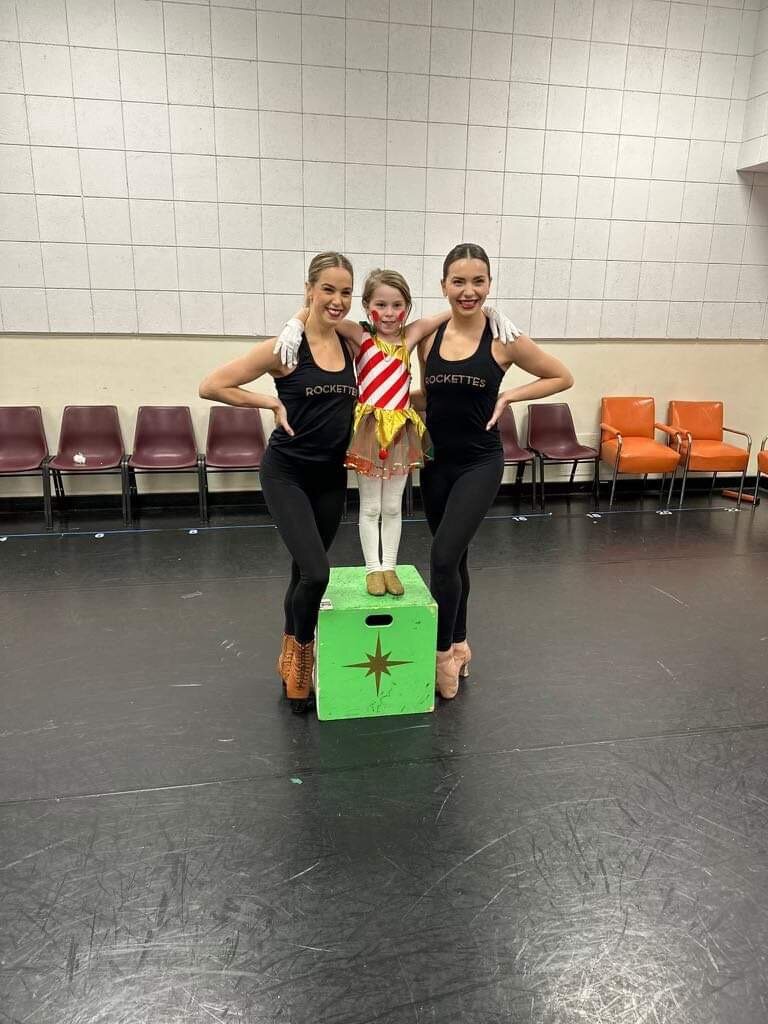 While at The Rockettes' annual holiday show, Clarke was surprised with a private dance class with The Rockettes themselves.