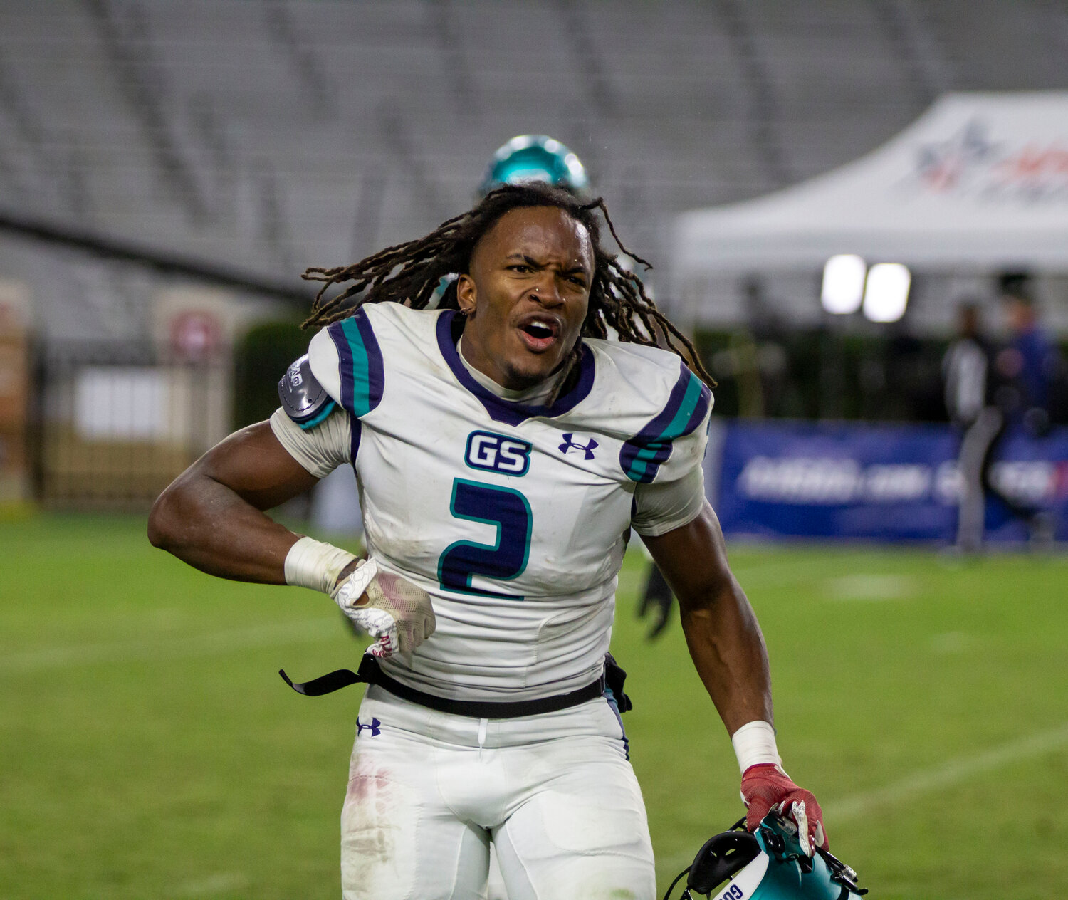 Ronnie Royal celebrates a one-handed interception that killed a Ramsay drive in the second half of Thursday’s Class 5A state title game between Gulf Shores and Ramsay in Tuscaloosa. Royal collected 4 tackles and added 188 rushing yards with 2 touchdowns on offense to help the Dolphins claim their first Blue Map 21-14.