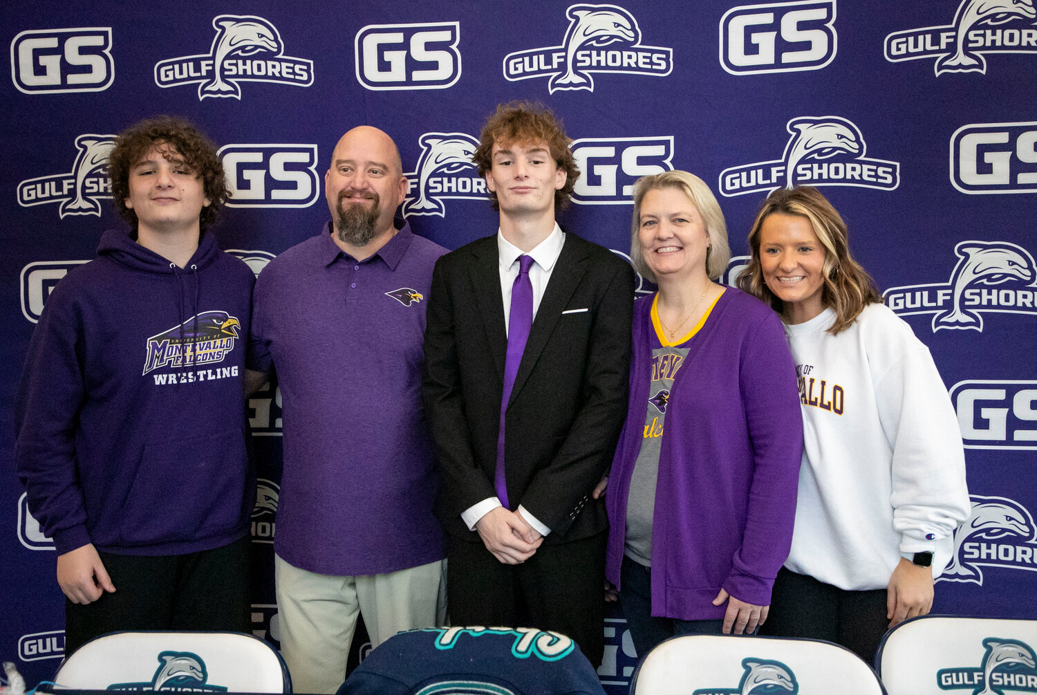 Ethan Sharkey was joined by his family in signing National Letters of Intent to wrestle and run outdoor track for the Montevallo Falcons after his time as a Gulf Shores Dolphin. The high school hosted a ceremony on Wednesday, Jan. 24, where Sharkey expressed his appreciation for those who helped him reach that point.
