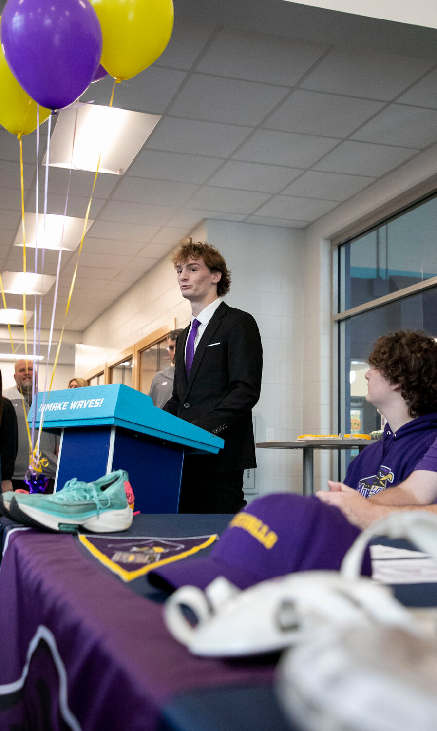 Ethan Sharkey addresses the crowd on hand at Wednesday’s signing ceremony where he cemented his dual commitment to wrestle and run outdoor track for the Montevallo Falcons. Sharkey collected his 200th career victory, and 150th via pin, this wrestling season and qualified for state in all four of his outdoor track events last season.