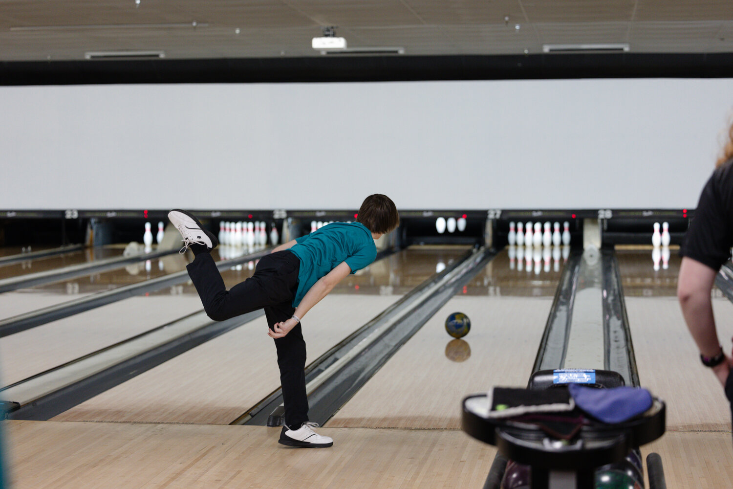 Gulf Shores’ Noah Karas follows through on a shot at the AHSAA State Bowling Championships in Mobile on Thursday, Feb. 1. The Dolphins entered the state tournament as a region champion for the first time.
