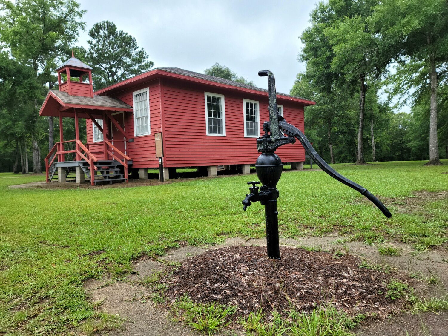 Step back in time at Bicentennial Park's restored one-room schoolhouse, offering a glimpse into the educational experience of early Baldwin County students.