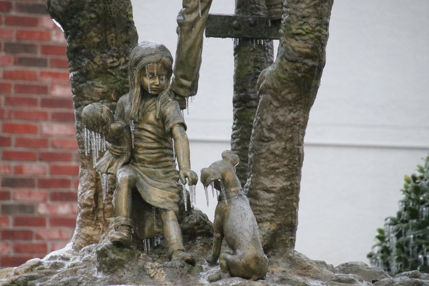 The statue at the entrance to Cedar Park Townhomes was encased in ice during the historic February snowstorm.