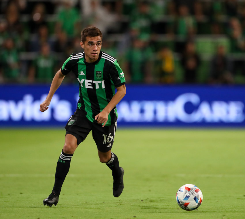 Austin FC midfielder Hector Jimenez (16) moves the ball during an MLS match between Austin FC and Minnesota United FC on October 16, 2021 in Austin, Texas.