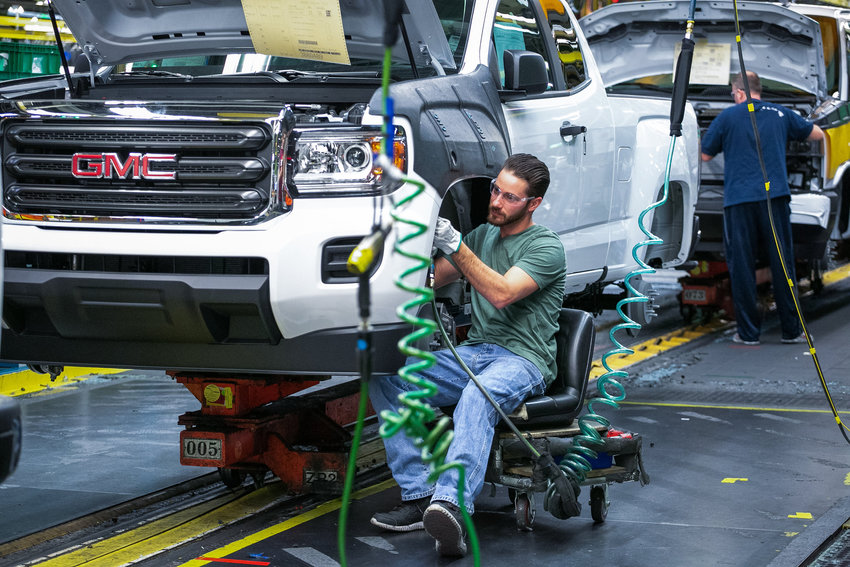 Employees work at the General Motors Wentzville Assembly plant on Friday, Dec. 13, 2019 in Wentzville, Missouri. Semiconductor shortages caused auto manufacturers to slash production. (Melissa Vaeth/General Motors/TNS)