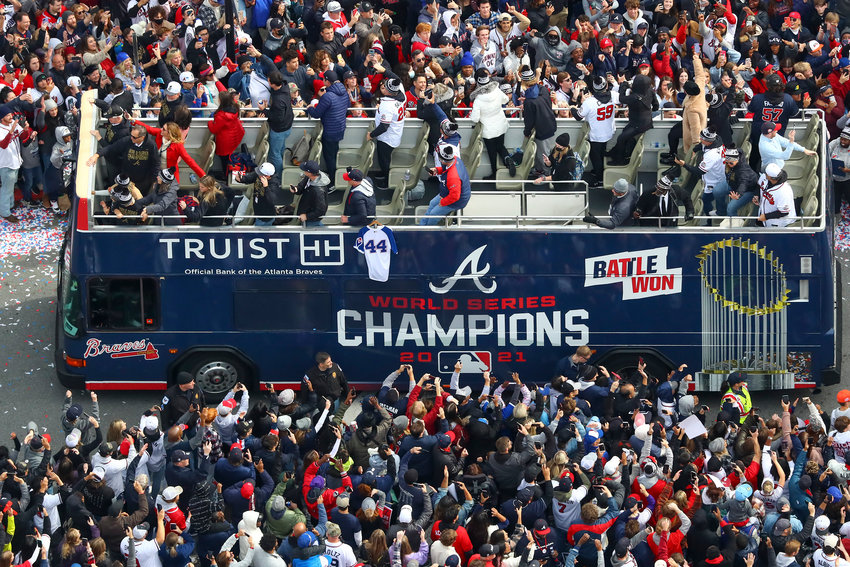 Fans cheer the World Series champion Atlanta Braves on Friday, Nov. 5, 2021, as they parade to Truist Park in Cobb County, Georgia. (Curtis Compton/Atlanta Journal-Constitution/TNS)