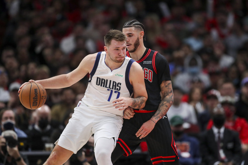 The Dallas Mavericks' Luka Doncic (77) works against the Chicago Bulls' Lonzo Ball during the first half at the United Center on Wednesday, Nov. 10, 2021, in Chicago. (Armando L. Sanchez/Chicago Tribune/TNS)