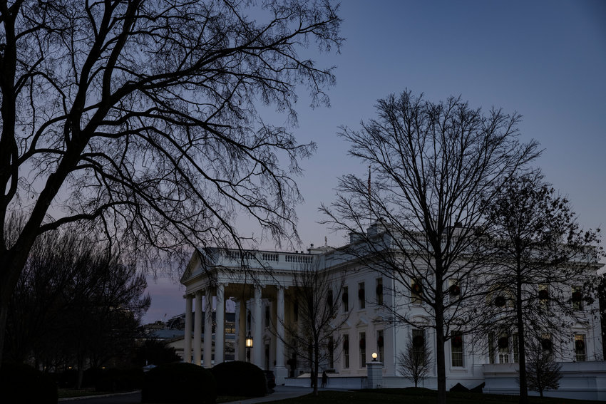 The White House at sunset in Washington, D.C. The Biden administration rolled out a new initiative aimed at reducing suicides by gun and combating the significant increases in suicides by members of the military and veterans.(Samuel Corum/Getty Images/TNS)