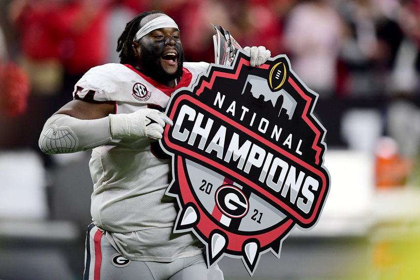 Justin Shaffer (54) of the Georgia Bulldogs reacts after defeating the Alabama Crimson Tide 33-18 during the 2022 CFP National Championship Game at Lucas Oil Stadium on January 10, 2022 in Indianapolis, Indiana. (Emilee Chinn/Getty Images/TNS)