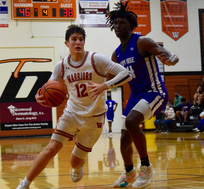 Senior Zach Engles scored 15 points for Westwood, and the Warriors beat Cedar Ridge 56-47 at home Tuesday night to win their fourth game in a row to remain tied atop the District 25-6A standings.