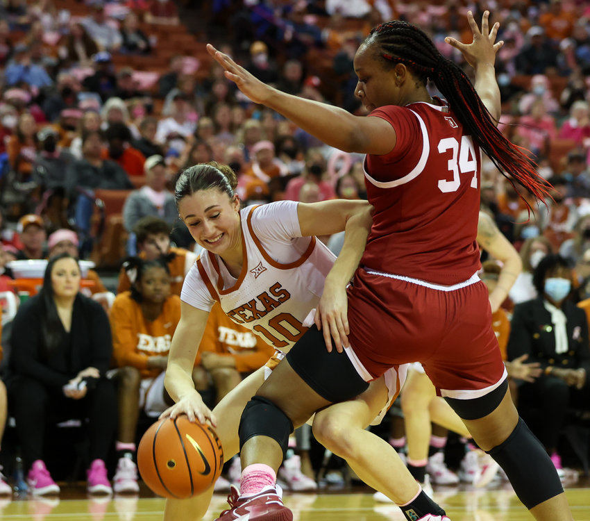 Texas Longhorns guard Shay Holle (10) works against Oklahoma Sooners forward Liz Scott (34) during an NCAA women&rsquo;s basketball game on February 12, 2022 in Austin, Texas.