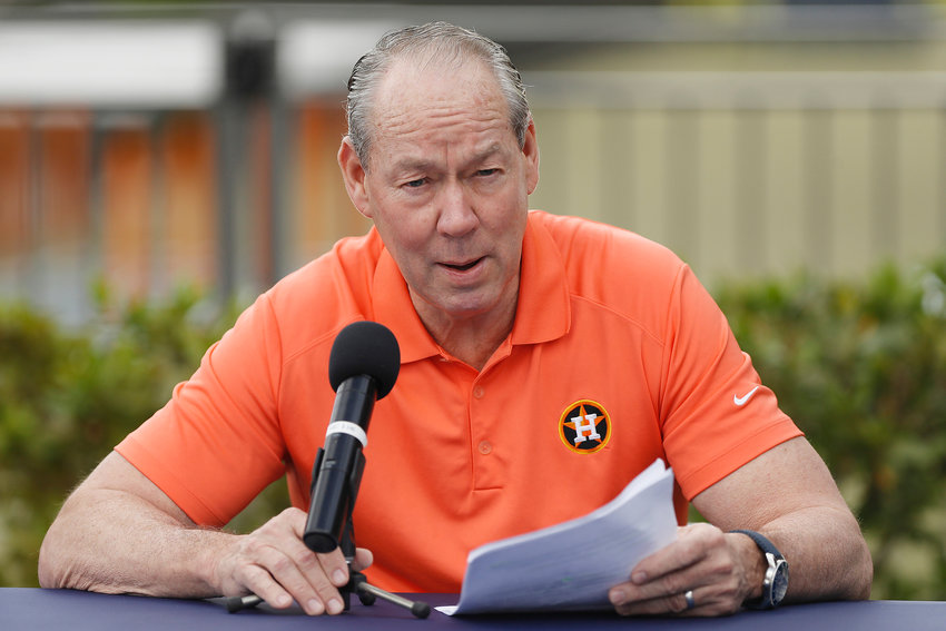 Owner Jim Crane of the Houston Astros reads a prepared statement during a press conference at FITTEAM Ballpark of The Palm Beaches, on Feb. 13, 2020, in West Palm Beach, Florida. (Michael Reaves/Getty Images/TNS)