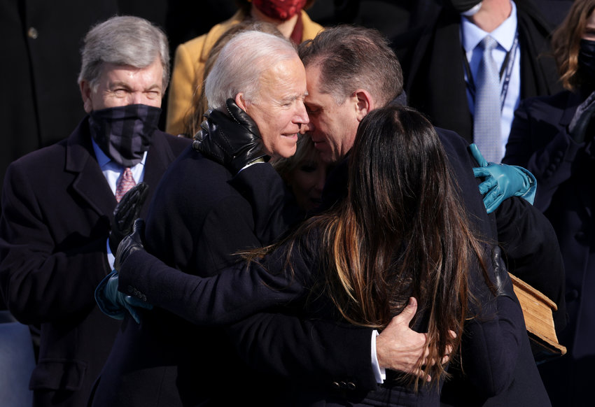 President Joe Biden hugs son Hunter Biden and daughter Ashley Biden after being sworn in as U.S. president during his inauguration on the West Front of the U.S. Capitol on Jan. 20, 2021, in Washington, D.C.  (Alex Wong/Getty Images/TNS)