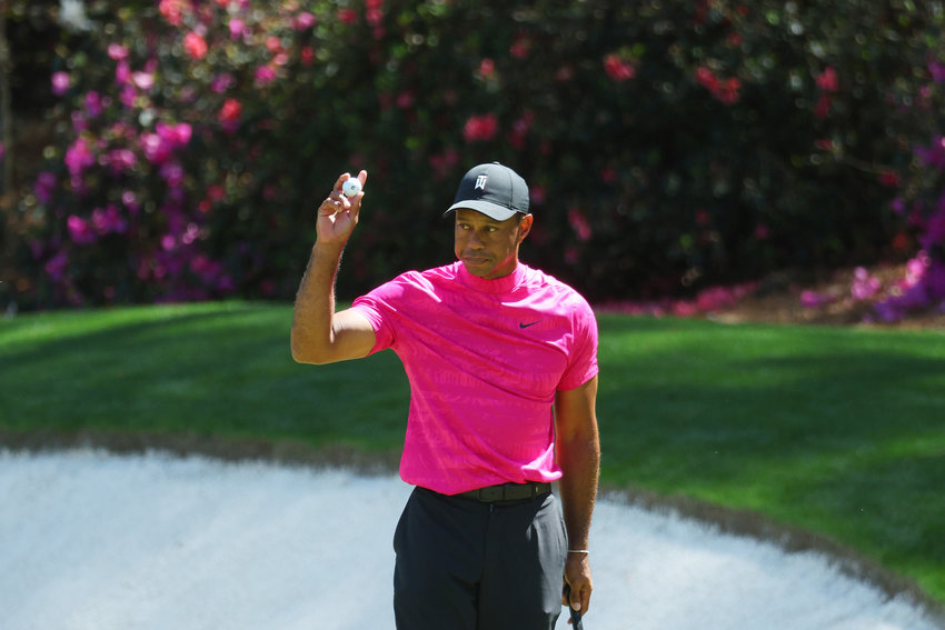Tiger Woods reacts after making birdie on the 13th green during the first round of the Masters at Augusta National Golf Club on Thursday, April 7, 2022, in Augusta, Georgia. (Andrew Redington/Getty Images/TNS)