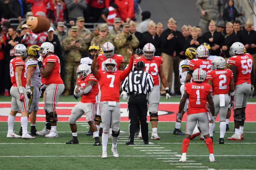 Ohio State Buckeyes quarterback Dwayne Haskins celebrates with the crowd as time winds down in the fourth quarter against the Michigan Wolverines at Ohio Stadium on Nov. 24, 2018, in Columbus, Ohio. (Jamie Sabau/Getty Images/TNS)