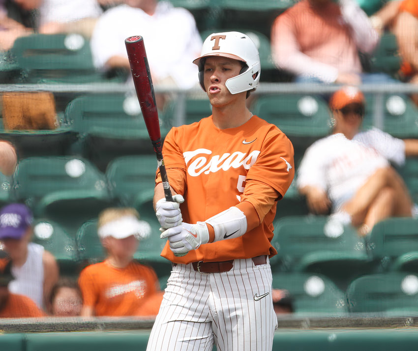 Texas infielder Skyler Messinger (5) at bat during an NCAA baseball game on April 10, 2022 in Austin, Texas. Texas won, 7-3, taking the series two games to one.