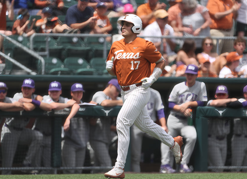 Texas infielder Ivan Melendez (17) heads home to score a run during an NCAA baseball game against TCU on April 10, 2022 in Austin, Texas. Texas won, 7-3, taking the series two games to one.