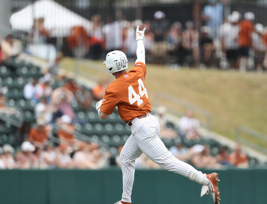 Texas designated hitter Austin Todd (44) gestures to the crowd after hitting a home run in the second inning of an NCAA baseball game against Baylor on April 24, 2022 in Austin, Texas.