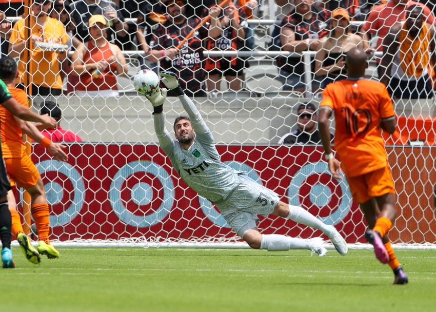 Austin FC goalkeeper Andrew Tarbell (31) makes a save during the first half of a Major League Soccer match between the Houston Dynamo and Austin FC on April 30, 2022 in Houston, Texas.