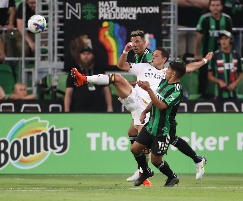 Los Angeles Galaxy forward Javier &ldquo;Chicharito&rdquo; Hern&aacute;ndez (14) extends to kick the ball toward the net during the second half of a major league soccer match between Austin FC and the Los Angeles Galaxy on May 8, 2022 in Austin, Texas.