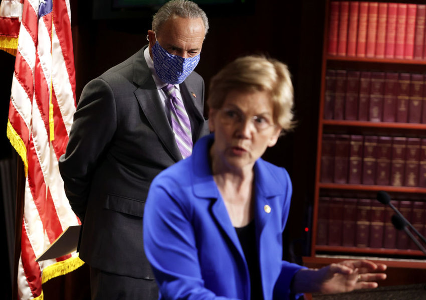 U.S. Senate Minority Leader Chuck Schumer, D-N.Y., and Sen. Elizabeth Warren, D-Mass., shown Sept. 9, 2020, are advocating that up to $50,000 in student loan forgiveness be given to each individual. (Photo by Alex Wong/Getty Images/TNS)