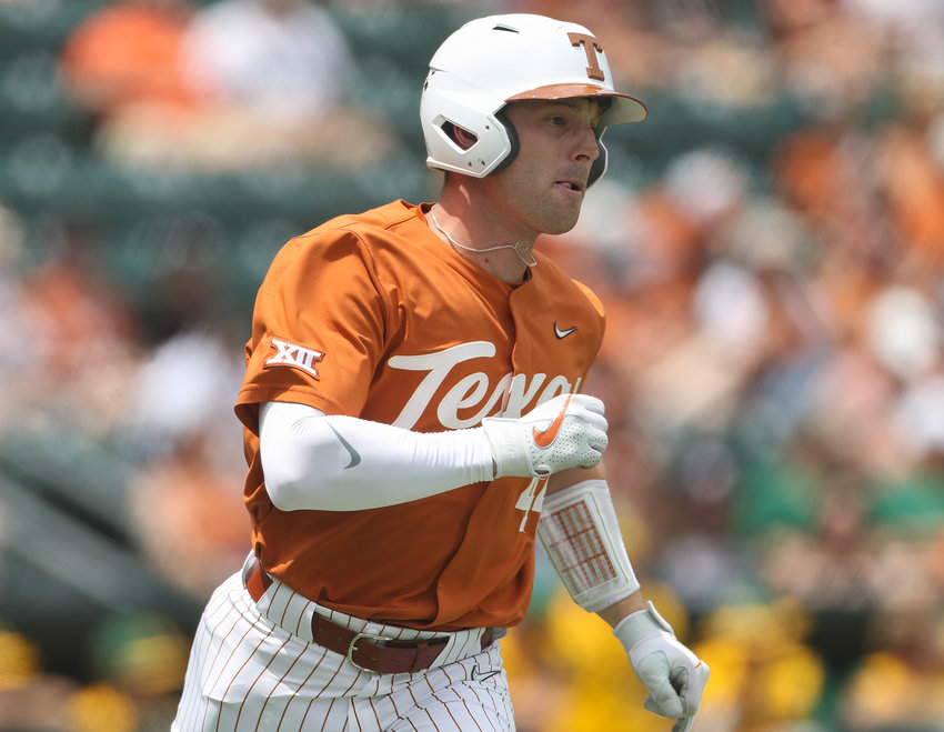 Texas designated hitter Austin Todd (44) runs to first base during an NCAA baseball game against Baylor on April 24, 2022 in Austin, Texas.