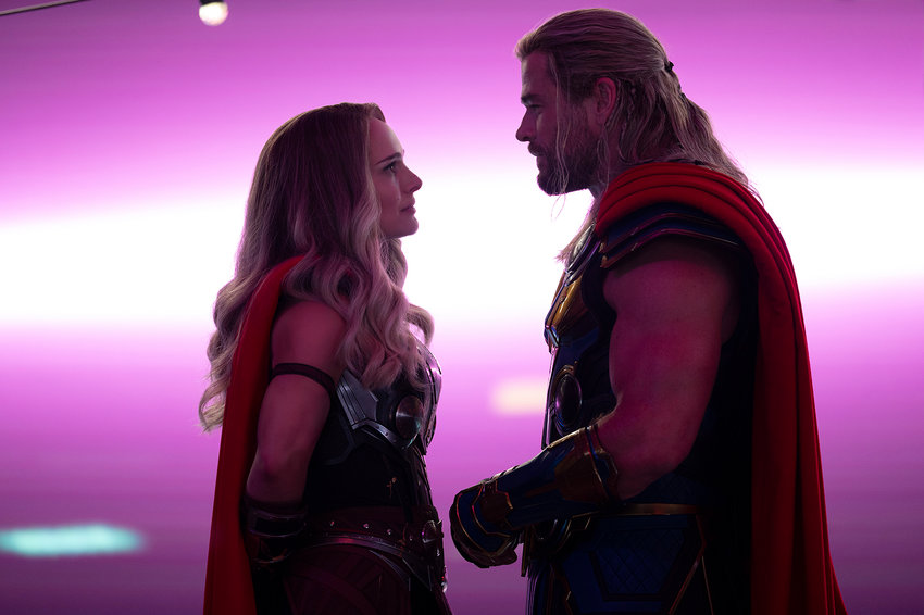 Natalie Portman, left, and Chris Hemsworth in Marvel's &quot;Thor: Love and Thunder.&quot;