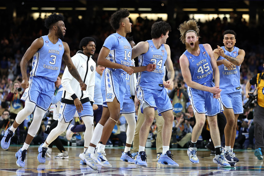 The North Carolina Tar Heels celebrate an 81-77 win against Duke in an NCAA  Tournament Final Four semifinal at Caesars Superdome on April 2, 2022, in New Orleans. (Jamie Squire/Getty Images/TNS)