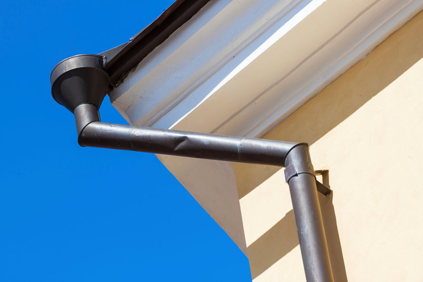 A rain gutter and downspout can channel rain into a collection device.
