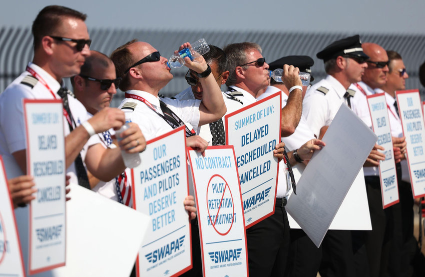 Southwest Airlines pilots picketed last summer outside Dallas Love Field over protracted contract negotiations. (Rebecca Slezak/The Dallas Morning News/TNS)