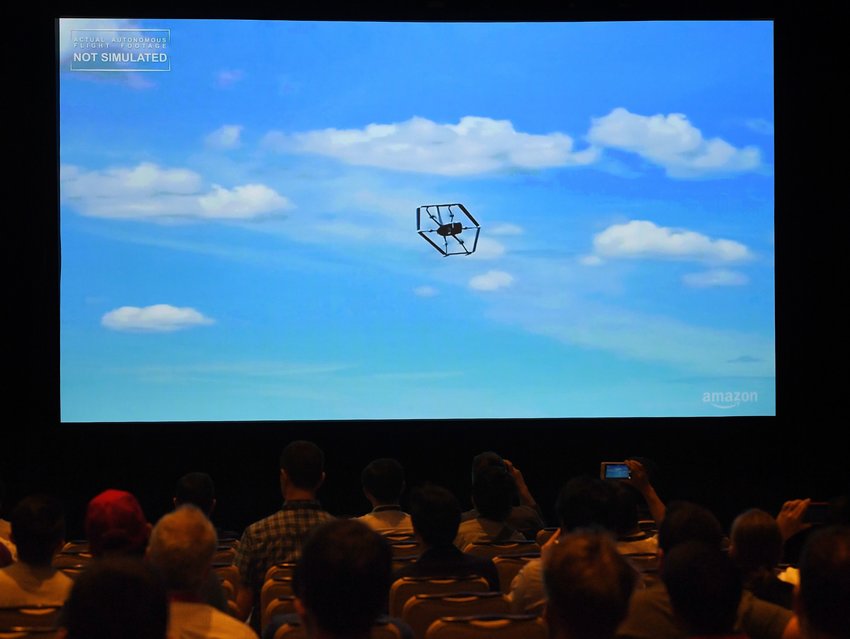 A former drone program worker at Amazon says he was pushed out after complaining about safety issues and discriminated against because of his race. In this photo from June 5, 2019, the Amazon delivery drone was displayed on a screen during a video presentation at the Amazon Re:MARS conference on robotics and artificial intelligence in Las Vegas, Nevada. (MARK RALSTON/AFP via Getty Images/TNS)