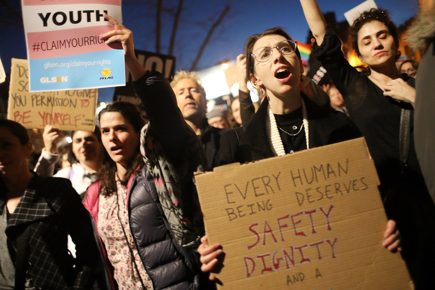 Hundreds protest a Trump administration announcement this week that rescinds an Obama-era order allowing transgender students to use school bathrooms matching their gender identities, at the Stonewall Inn on Feb. 23, 2017, in New York. (Spencer Platt/Getty Images/TNS)
