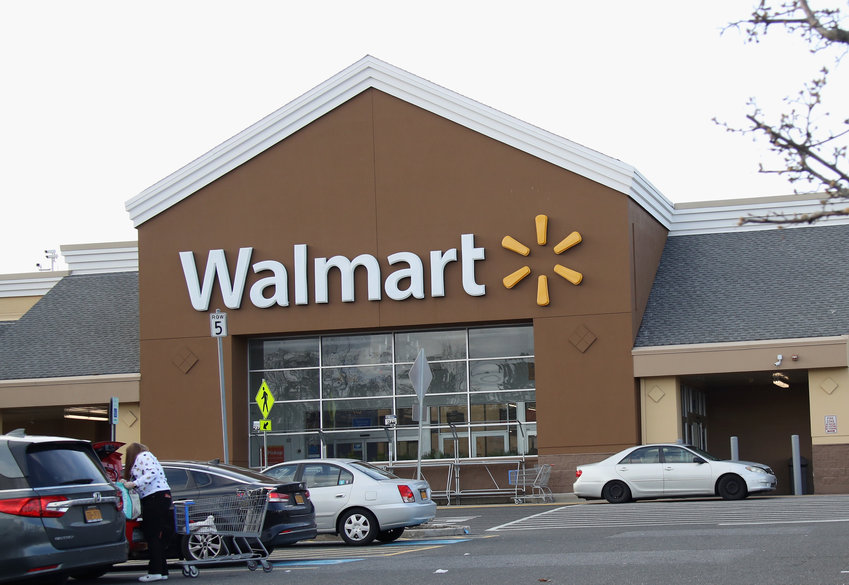 An image of the sign for Walmart as photographed on March 16, 2020, in East Setauket, New York. (Bruce Bennett/Getty Images/TNS)