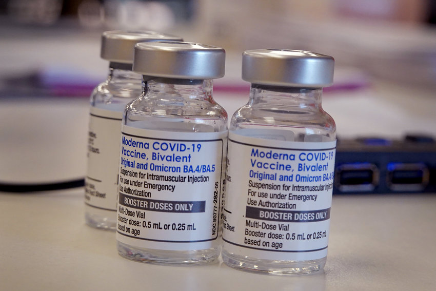 A pharmacist prepares to administer COVID-19 vaccine booster shots during an event hosted by the Chicago Department of Public Health at the Southwest Senior Center on September 09, 2022, in Chicago, Illinois.