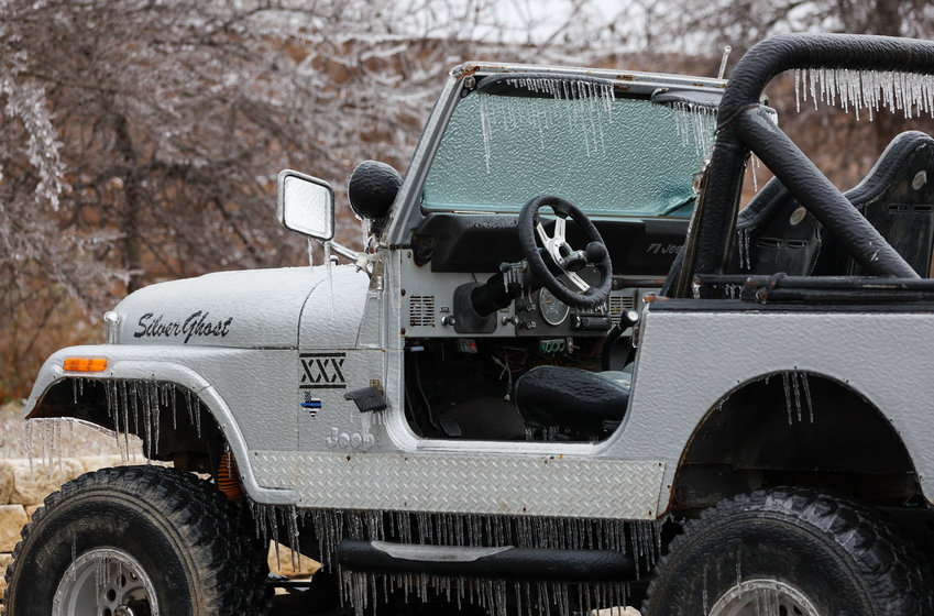 Freezing rain covered Central Texas with as much as &frac34; inch of ice overnight, forcing school and business closures and leaving more than 130,000 without power across the Austin metro area Wednesday morning, Feb. 1, 2023.