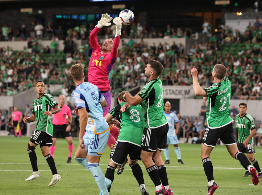 Austin FC goalkeeper Brad Stuver (1) has the ball slip through his hands during a Major League Soccer match on March 25, 2023 in Austin, Texas.