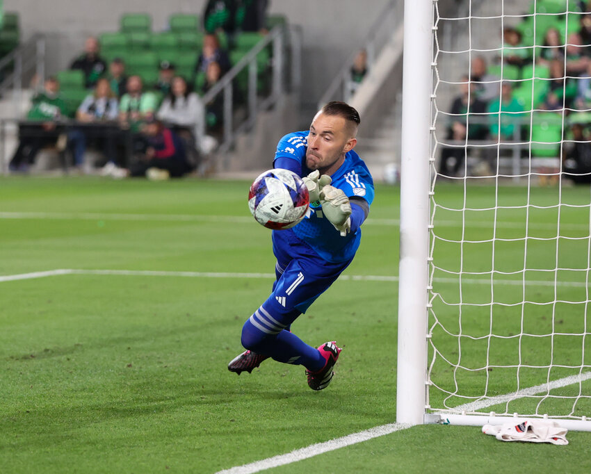 Austin FC goalkeeper Brad Stuver (1) dives to make a save during a Major League Soccer match between Austin FC and St. Louis City SC on Feb. 25, 2023, in Austin.