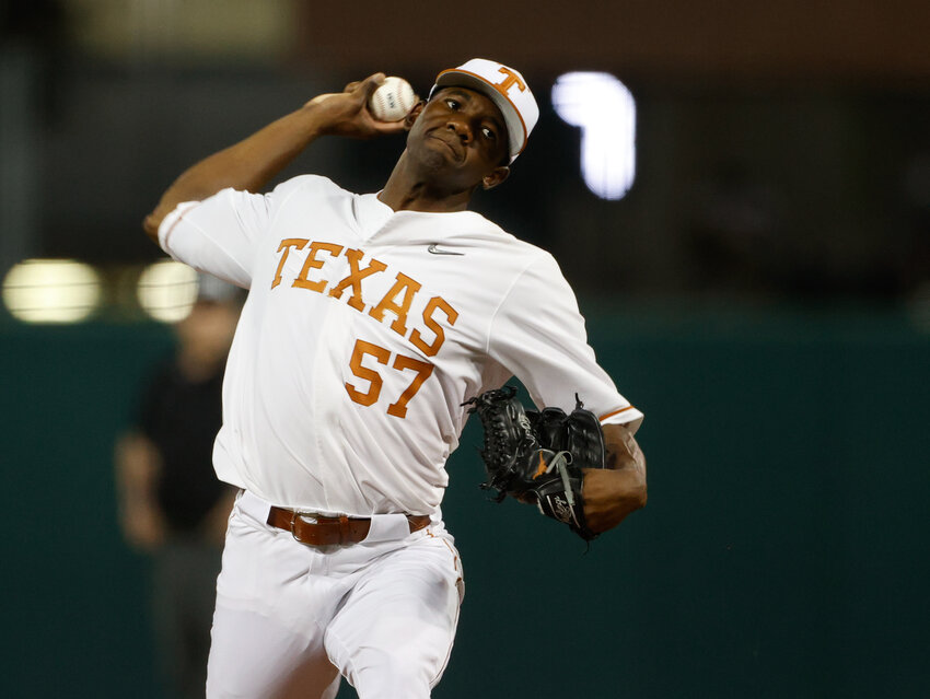 Texas pitcher Lebarron Johnson Jr. (57) on the mound during an NCAA college baseball game between Texas and LSU on Feb. 28, 2023, in Austin.
