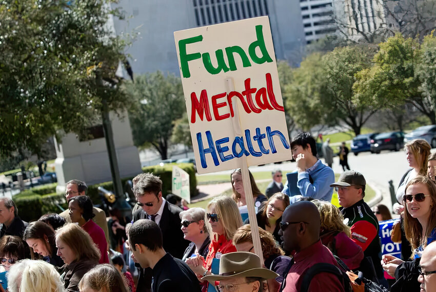 Demonstrators participate in a mental health rally at the Texas Capitol, organized by the National Alliance on Mental Illness, in 2013.